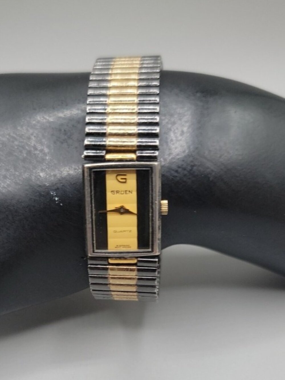 Vintage Gruen 227-PUW510 Two-Tone Rectangular Tank Watch Black & Gold Dial 17mm